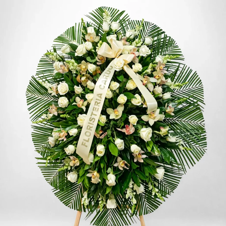 rosas, cymbidium y follaje.