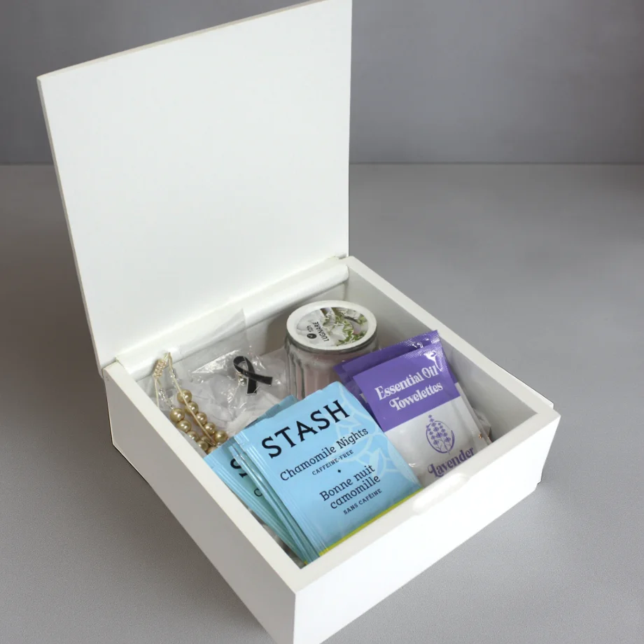 Kit de Duelo Camino de Serenidad con vela aromática, té, denario y guía para el manejo del duelo.